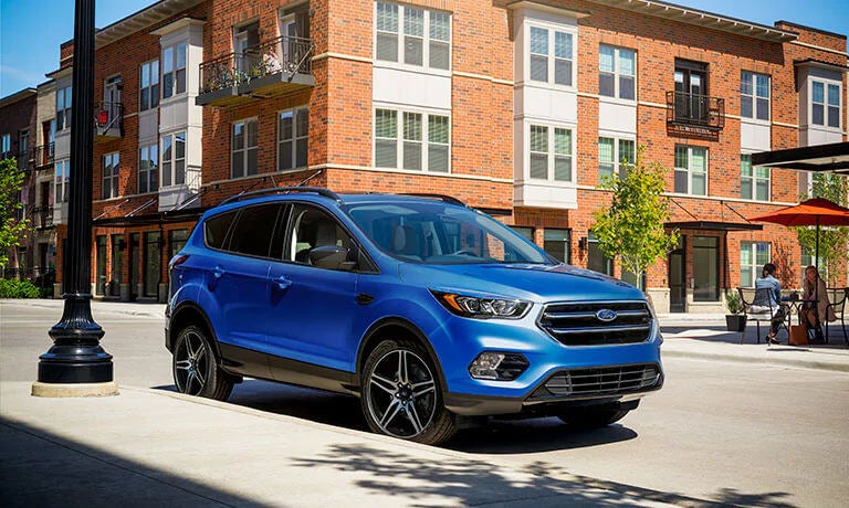 Blue 2019 Ford Escape parked on street exterior view