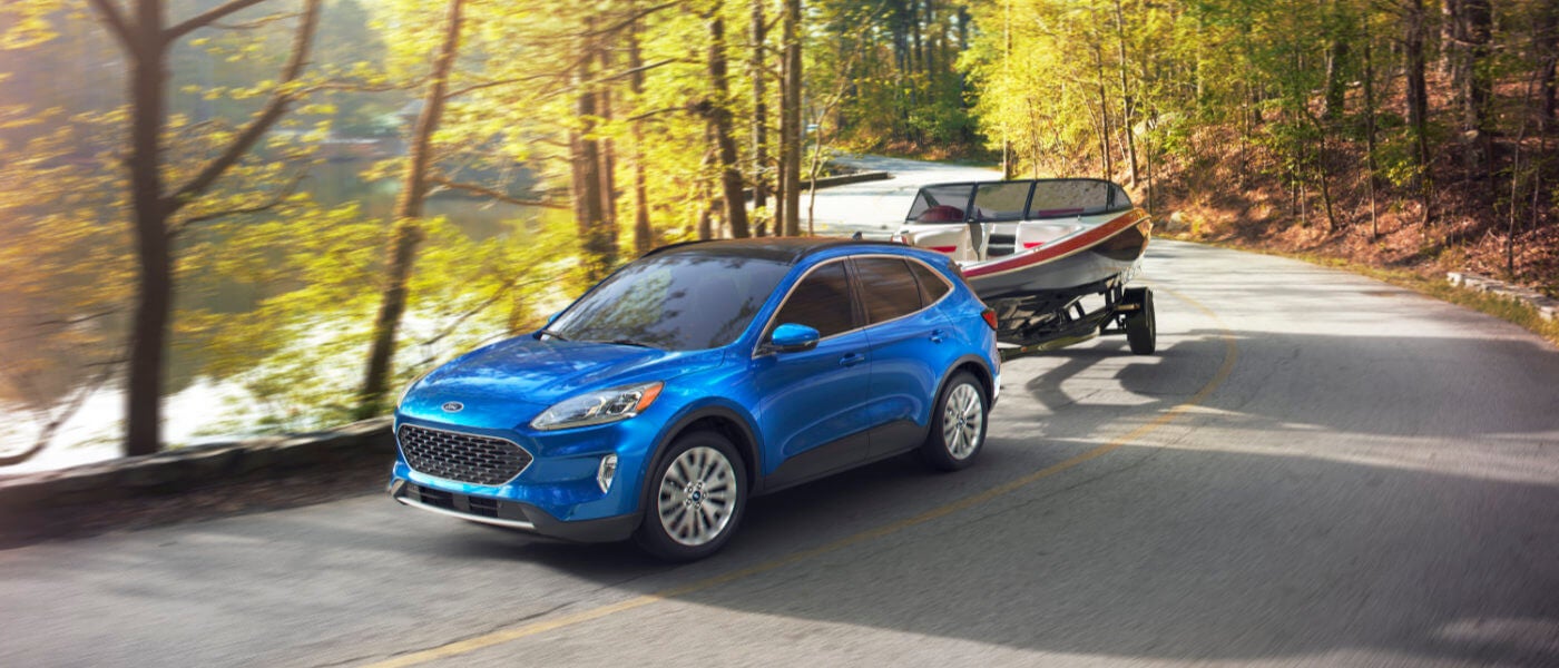 2022 Ford Escape towing a small boat