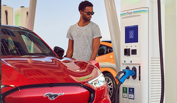 2023 Ford Mustang Mach-E at a charging station