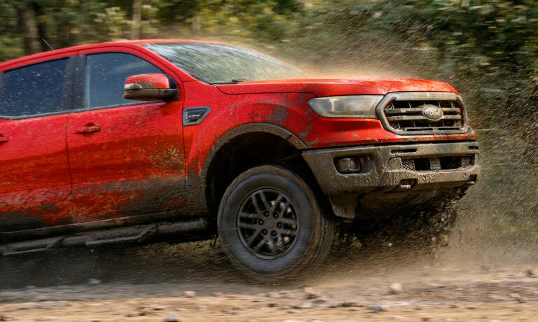 2023 Ford Ranger offroadiing covered in mud