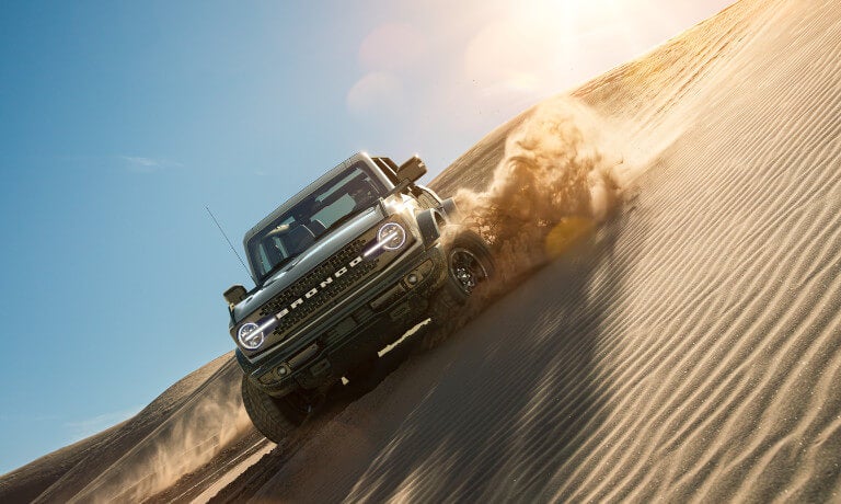 2024 Ford Bronco driving in sand dunes