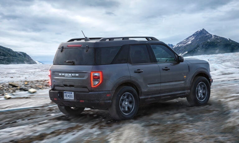 2025 Ford Bronco driving in icy mountains