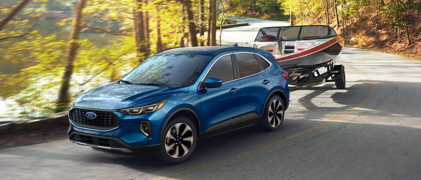2025 Ford Escape towing a boat