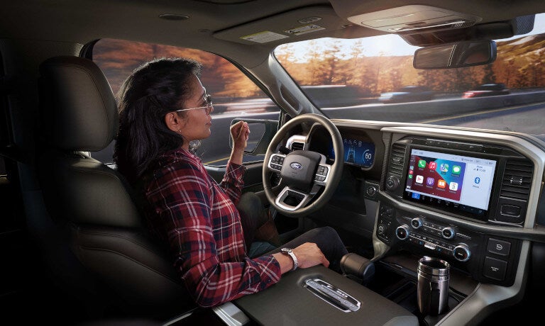 2025 Ford F-150 front with hands-off driver