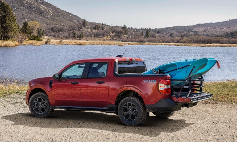 2025 Ford Maverick by a lake with a kayak
