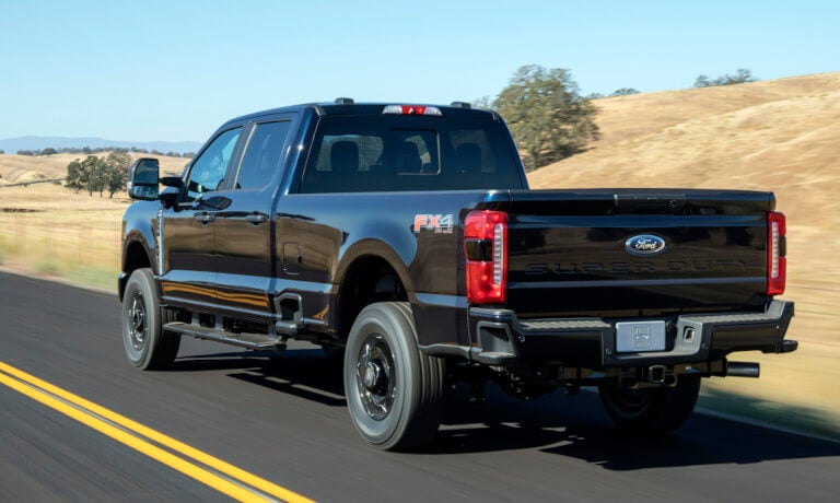 2026 Ford Super Duty driving away on a highway