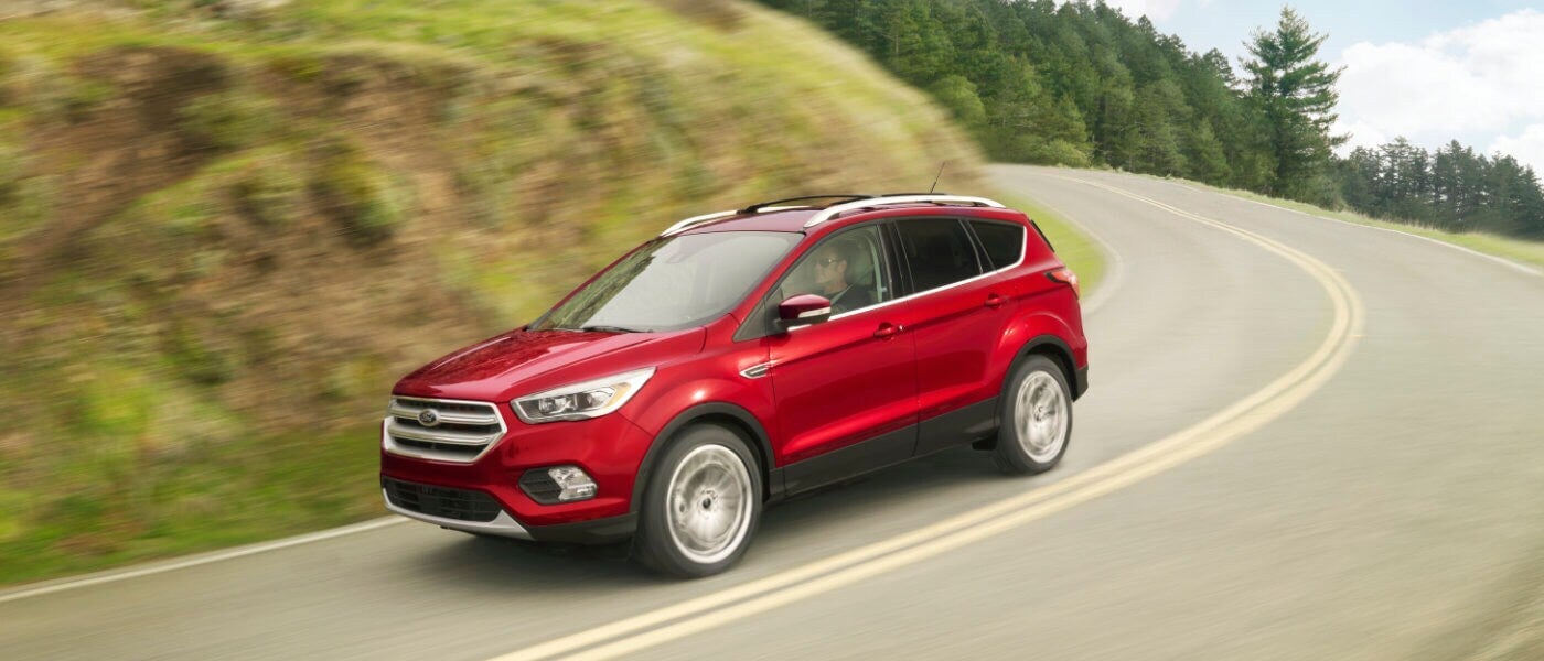 Red 2019 Ford Escape on road