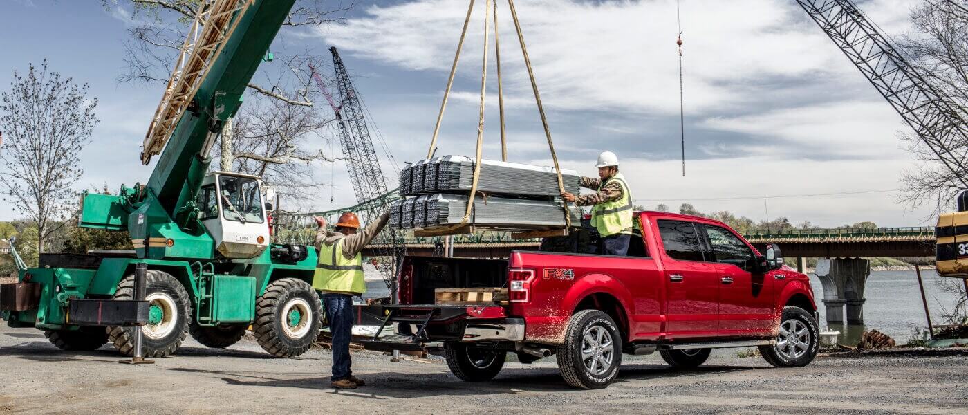 Red 2019 Ford F-150 on construction site