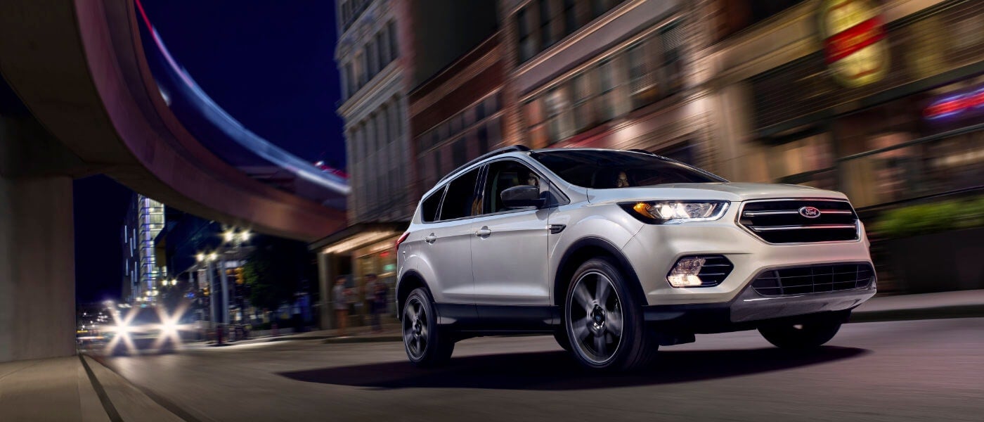 Silver 2019 Ford Escape on road